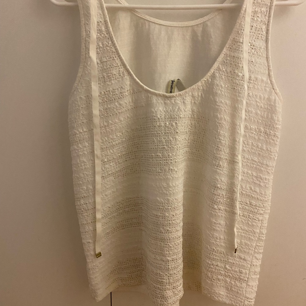 White top with gold details
